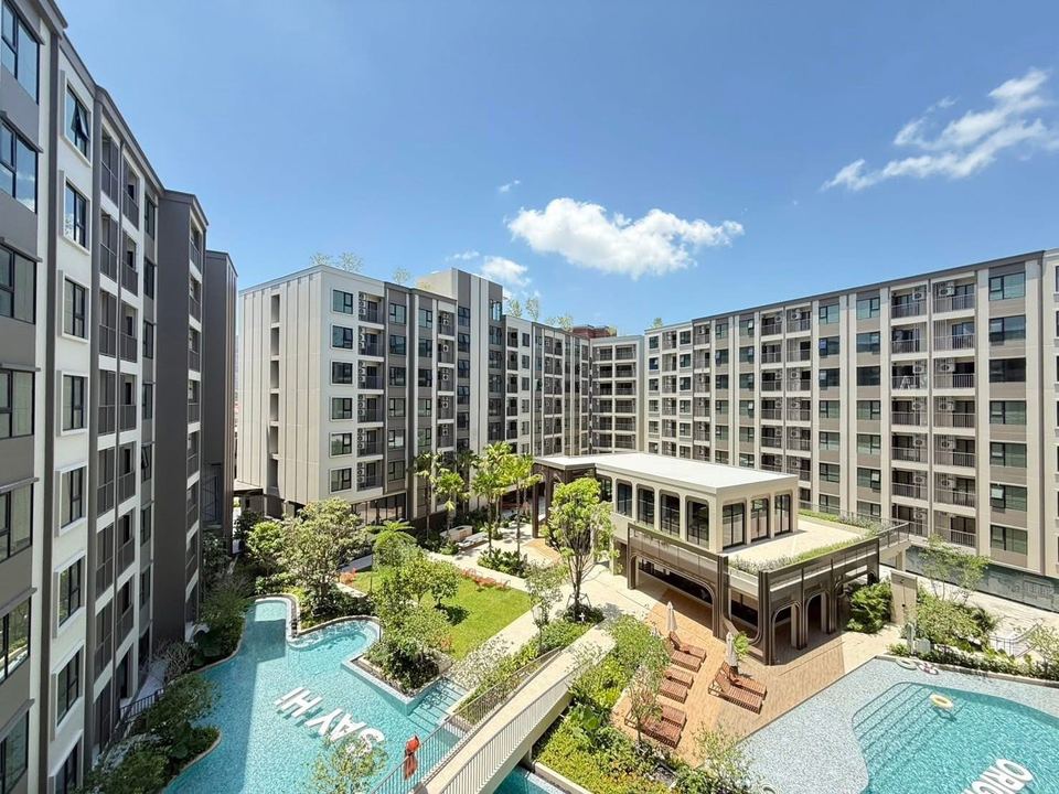Aerial view of the condominium courtyard and lagoon pool